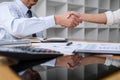 Meeting and greeting concept, Two collaboration business handshake and business people after discussing good deal of contract and Royalty Free Stock Photo