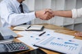 Meeting and greeting concept, Two collaboration business handshake and business people after discussing good deal of contract and Royalty Free Stock Photo