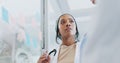 Meeting, healthcare and collaboration with a doctor black woman coaching her team on glass in a hospital. Planning Royalty Free Stock Photo