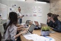 Meeting of multiracial professional teamwork with coworkers at the business office Royalty Free Stock Photo