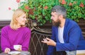 Meeting people first date. Couple terrace drinking coffee. Casual meet acquaintance public place. Romantic couple Royalty Free Stock Photo