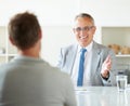 Meeting, people and happy mature lawyer with advice in office for legal consulting and feedback for client, Businessman Royalty Free Stock Photo