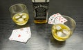 Meeting for a poker game. To drink a glass of Jack Daniel`s with