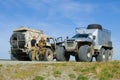 Meeting on the road. Two all-terrain vehicles `Trekol` stand on the north road