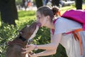 Meeting a young girl in the Park with the dog