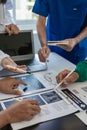 Meetings and laptops for office teams to discuss Brainstorming and Planning Doctors, nurses and computers Royalty Free Stock Photo