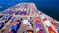 Mega port terminal with loading platform and storage for maritime containers Royalty Free Stock Photo