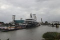 Mega ship yacht Lonian between small bridges and rivers at Gouda to Rotterdam