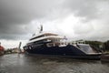 Mega ship yacht Lonian between small bridges and rivers at Gouda to Rotterdam Royalty Free Stock Photo