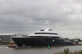 Mega ship yacht Lonian between small bridges and rivers at Gouda to Rotterdam Royalty Free Stock Photo