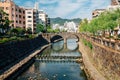 Megane-bashi spectacles bridge with city view in Nagasaki, Japan Royalty Free Stock Photo