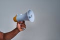 Megaphone held by african american person