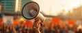 The megaphone raised high during a vibrant protest rally in a city setting..AI generated image Royalty Free Stock Photo