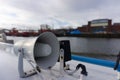 Megaphone on a ship in a harbour