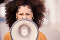 Megaphone, speaker and black woman leading a street protest for change, equality and democracy. Noise, politics and