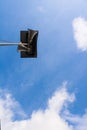 Megaphone towering high into cloud and sky