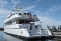 Megayacht reflecting on still waters in the marina. Royalty Free Stock Photo