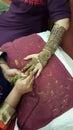 Detailed process of applying intricate pattern Henna on hand