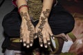 Mehandi Henna design on woman hands