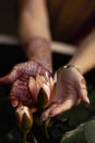 Mehndi adorns the women& x27;s hands with a beautiful flower design.Vesak day Royalty Free Stock Photo