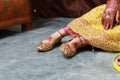 Mehndi design on bride feet. Royalty Free Stock Photo