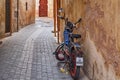 MEKNES, MOROCCO - JUNE 01, 2017: Old motobike near the wall in Meknes medina. Meknes is one of the four Imperial cities of Morocco