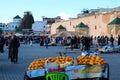 Market on El Hedim square with lots of people and stalls.