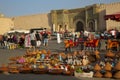 Trade in El Hedim Square and Bab Mansour gate in Meknes, Morocco. Royalty Free Stock Photo