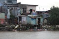 Mekong river and dilapidated houses