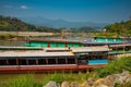 Mekong river, Laos and Thailand at Huay Xai. Traditional wooden boats