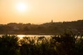 Mekong river, Laos and Thailand at Huay Xai. Sunset golden light on the river water.