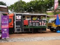 Food vendors use food trucks to sell food in crowded places