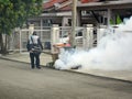 The fogging of mosquito repellent is being carried out using a special machine.