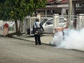 The fogging of mosquito repellent is being carried out using a special machine.