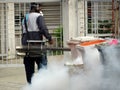 The fogging of mosquito repellent is being carried out using a special machine.