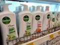 Liquid bath soap in plastic bottles and commercial soft packets. Sorted by type and brand.