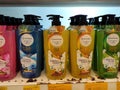 Liquid bath soap in plastic bottles and commercial soft packets. Sorted by type and brand.