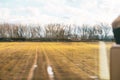 Melancholic concept of travel in autumn by train. View from the window Royalty Free Stock Photo