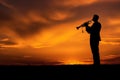 Melancholic Man trumpet sunset. Generate Ai