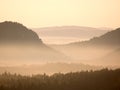 Melancholic morning after rainy night. Valley full of spring mist. Royalty Free Stock Photo