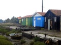 Wet wooden fisherman huts, sad and rainy weather. Ocean, Ile d\'Oleron, France