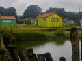 Wet wooden fisherman huts, sad and rainy weather. Ocean, Ile d\'Oleron, France Royalty Free Stock Photo