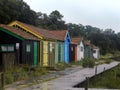 Wet wooden path after the rain, lonely wooden huts. Ocean, Ile d\'Oleron, France