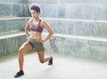 Melanesian pacific islander athlete girl with afro performing exercising routines Royalty Free Stock Photo