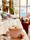 Melange and cantuccini enjoyed in the famous Haas Haus in vienna with a view on the Stephansdom. Royalty Free Stock Photo