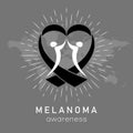 Melanoma awareness and black heart shape ribbon on map background. Skin cancer awareness