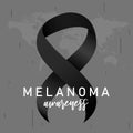 Melanoma awareness and black ribbon on map background. Skin cancer awareness