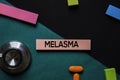 Melasma text on sticky notes. Office desk background. Medical or Healthcare concept