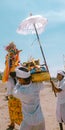 Melasti ceremony in bali petitenget beach