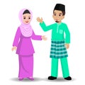 Melayu couple celebrating Hari Raya Aidilfitri